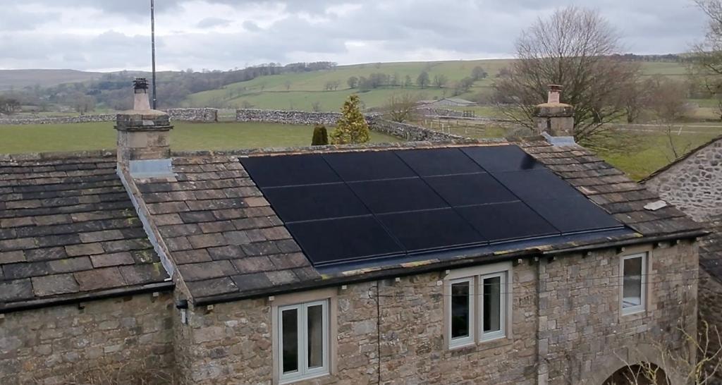 In-roof solar panels integrated flush into a UK residential roof