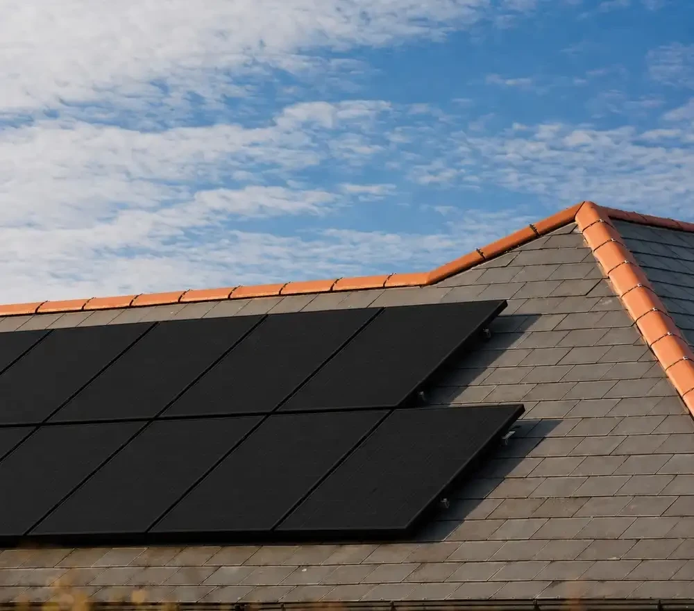 UK semi-detached house with solar panels installed on roof