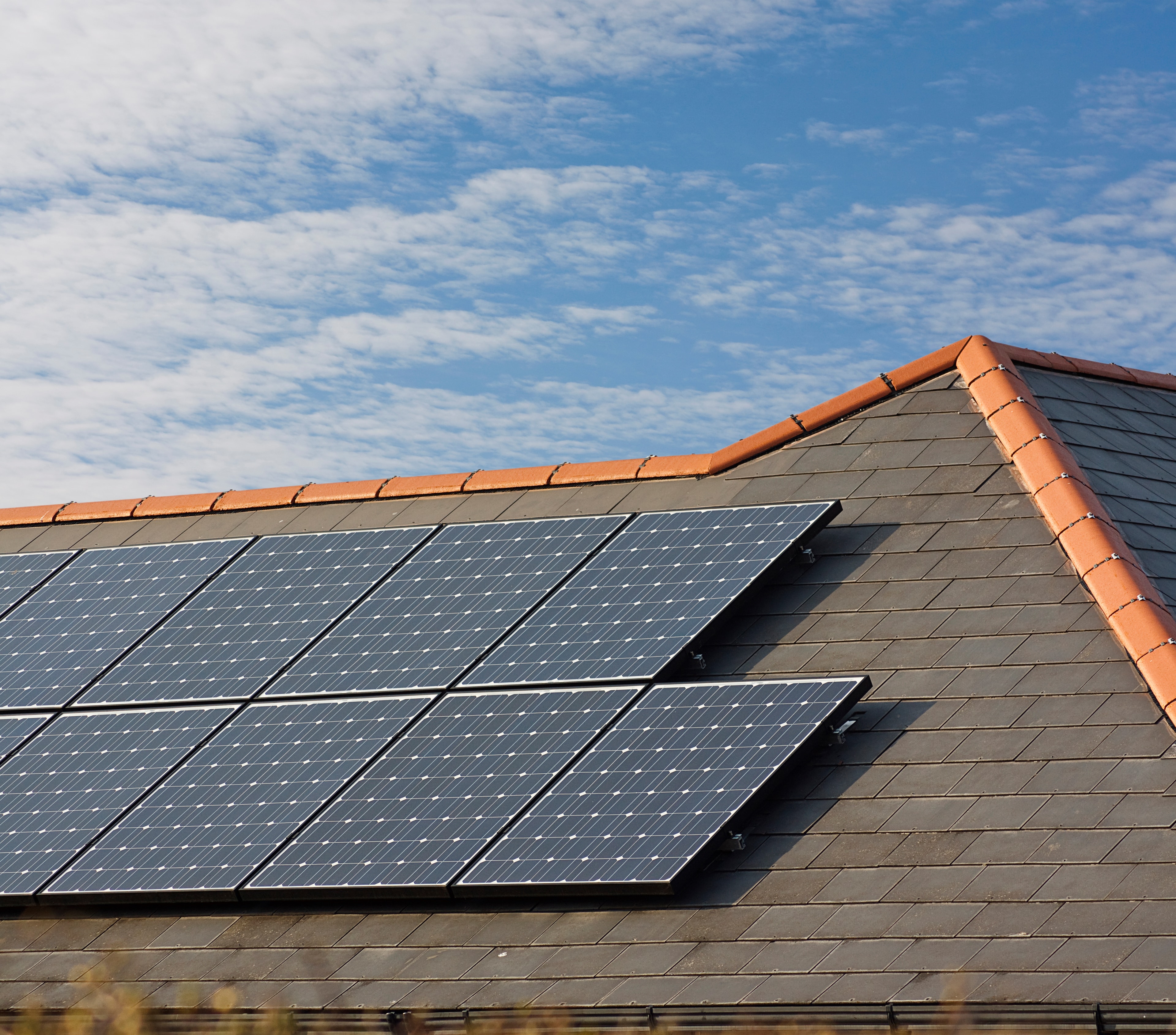 British terraced houses with rooftop solar panels
